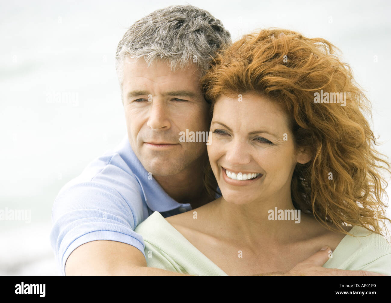 Mature couple cheek to cheek Stock Photo