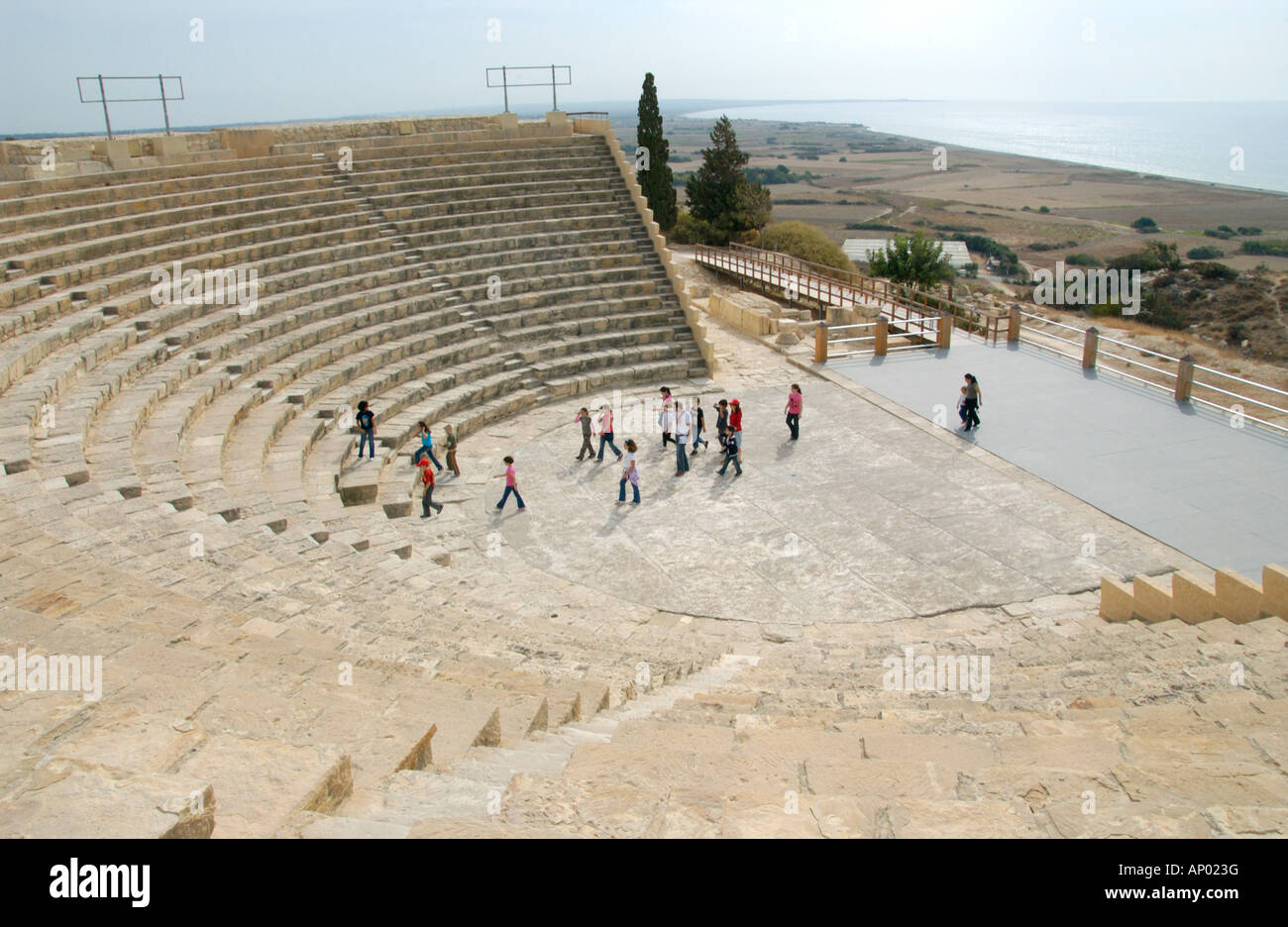 Primary school pupils on guided tour amphitheatre in ancient site of Kourion near Episkopi on the Mediterranean island of Cyprus Stock Photo
