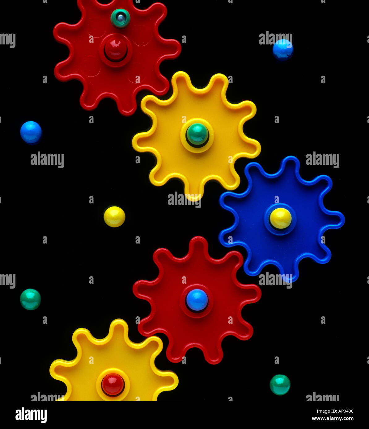 Toy wheels cogs that grip into each other Stock Photo Alamy