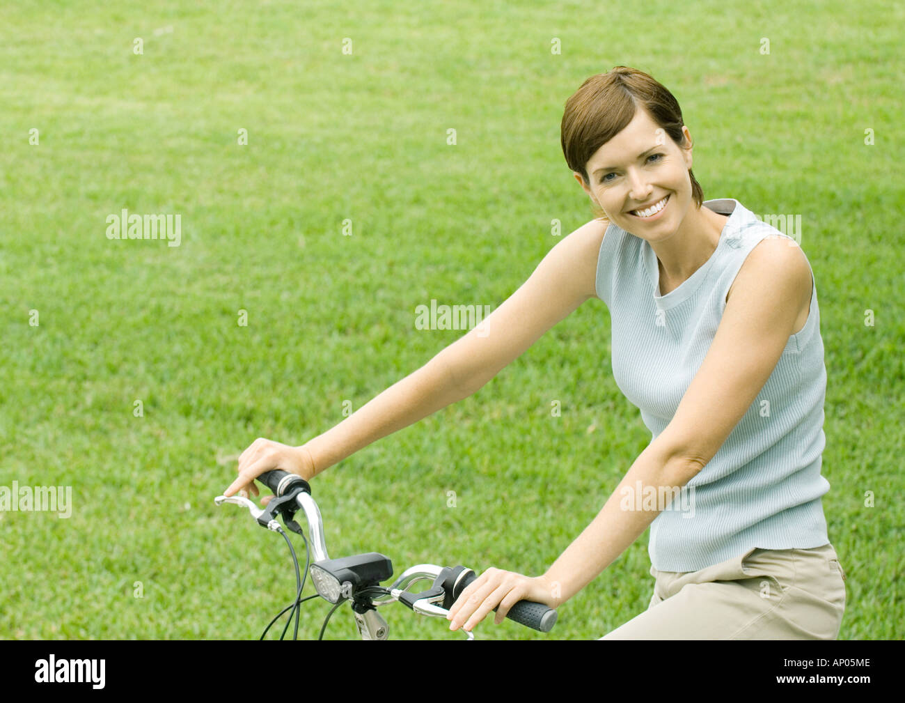 Woman on bicycle, portrait Stock Photo