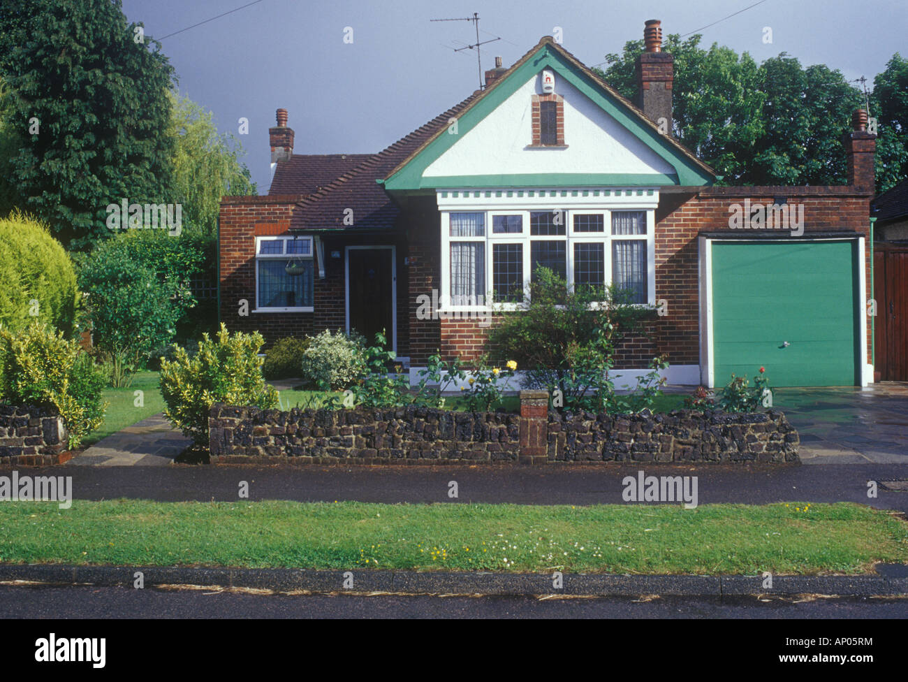 Bungalow at Ewell, Surrey, UK. Small interwar bungalow in quiet suburban street in Home Counties commuter belt Stock Photo