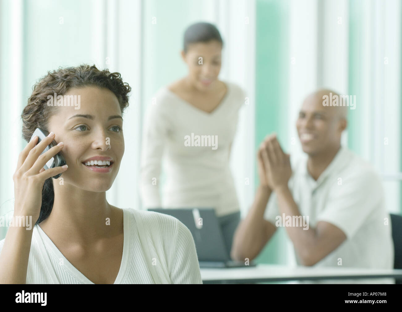 Woman using cell phone Stock Photo