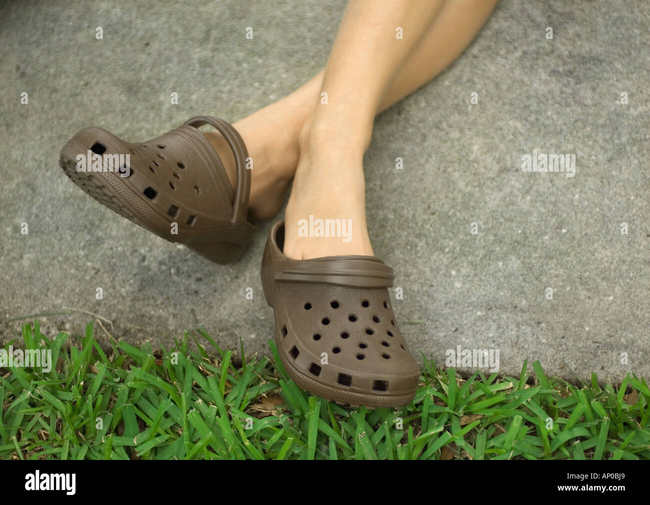 Legs crossed at ankles hires stock photography and images Alamy