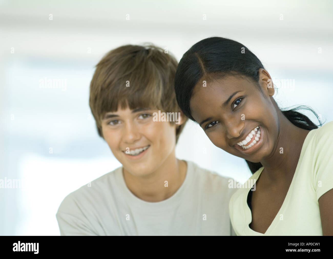 Preteen boy and girl smiling Stock Photo