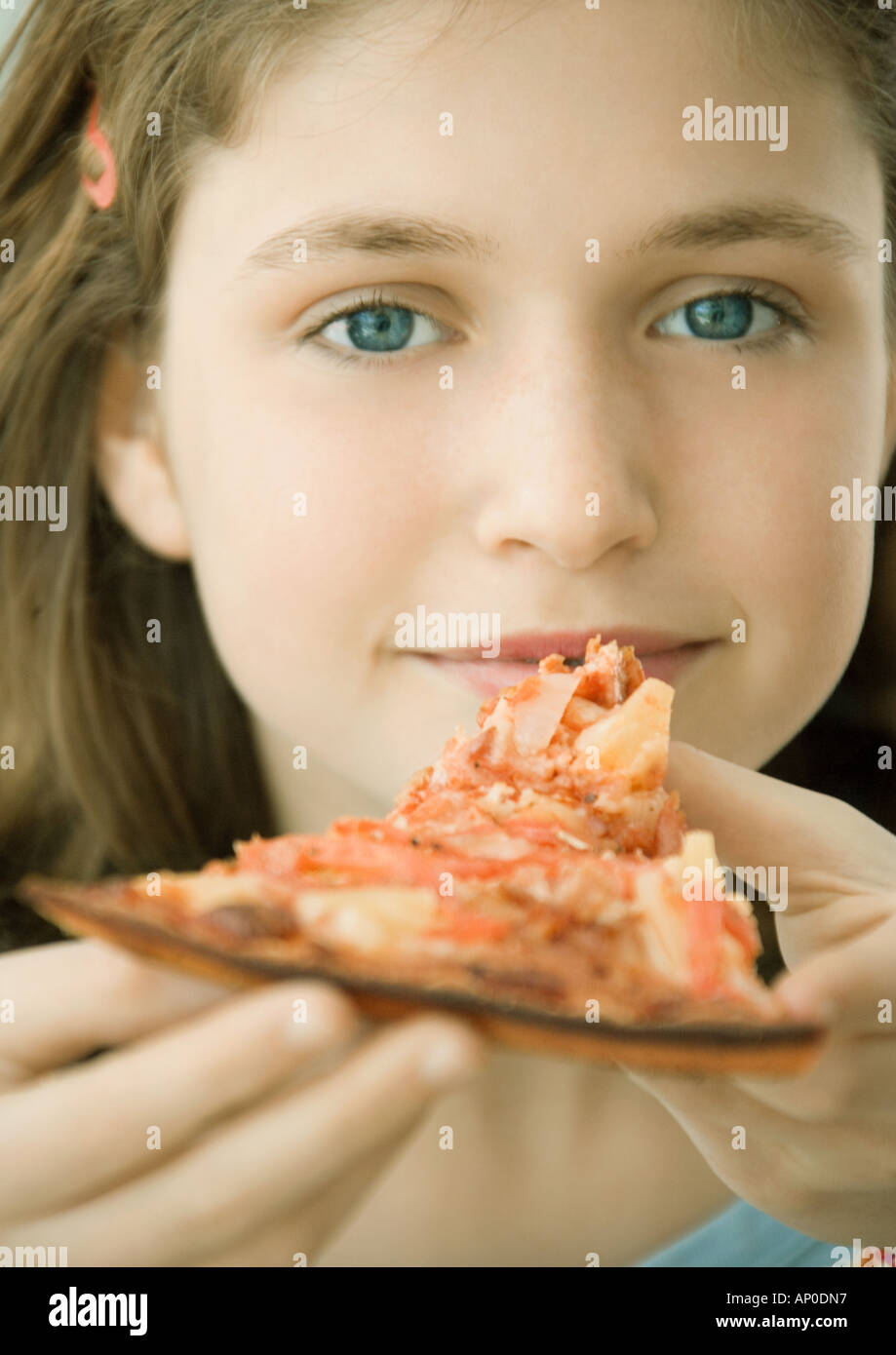 Girl eating pizza at school hires stock photography and images Alamy