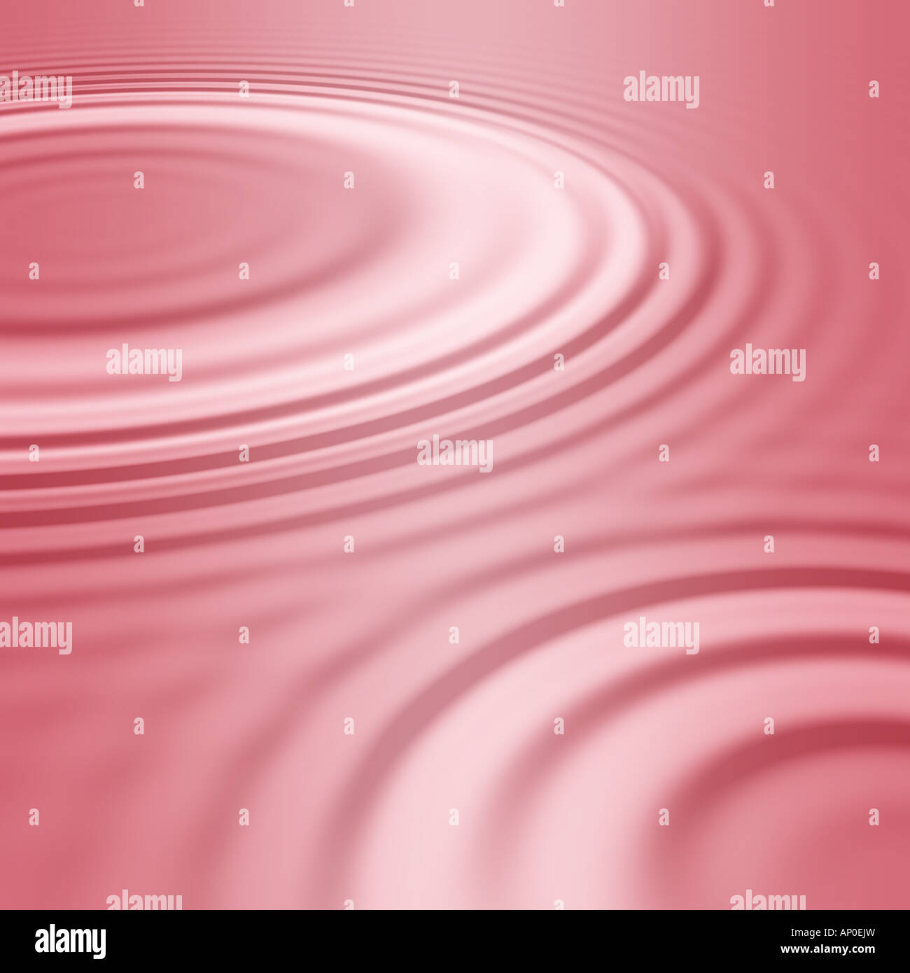 water ripples from two drops in pink Stock Photo