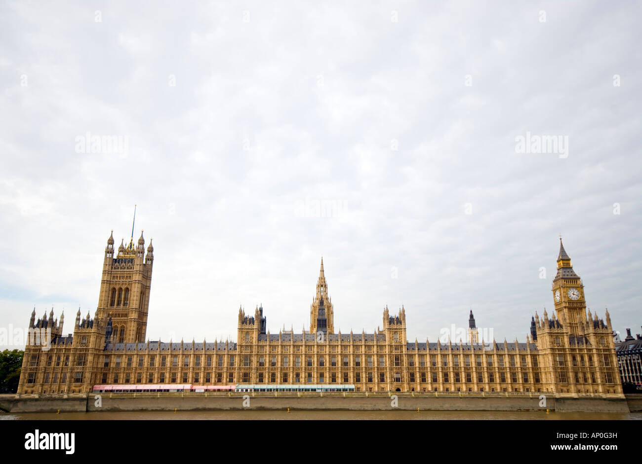 British Houses of Parliament from Queens Way Space for text Overcast sky Copyspace Stock Photo