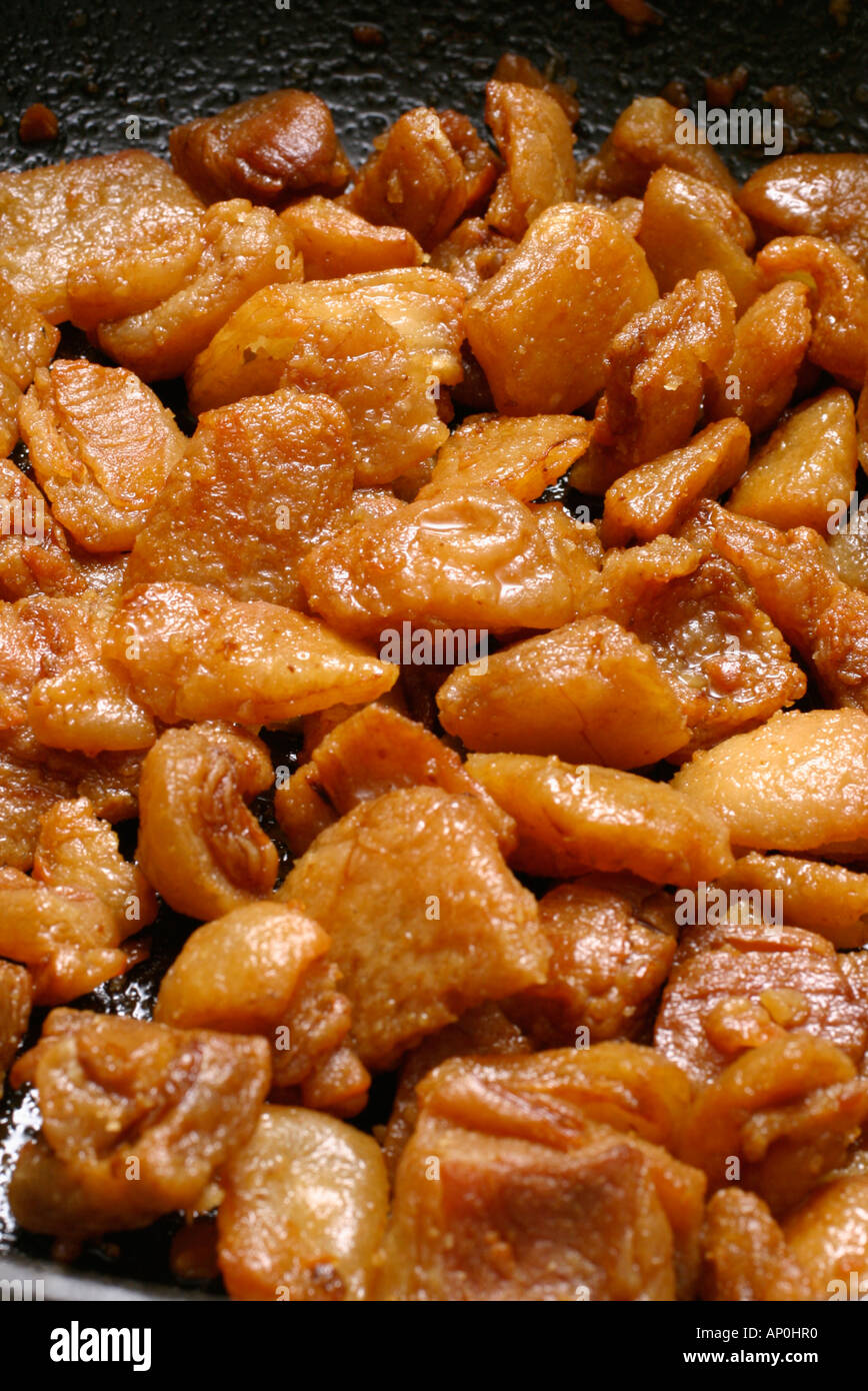 crackling or cracklin the remains of rendered pork fat Stock Photo Alamy