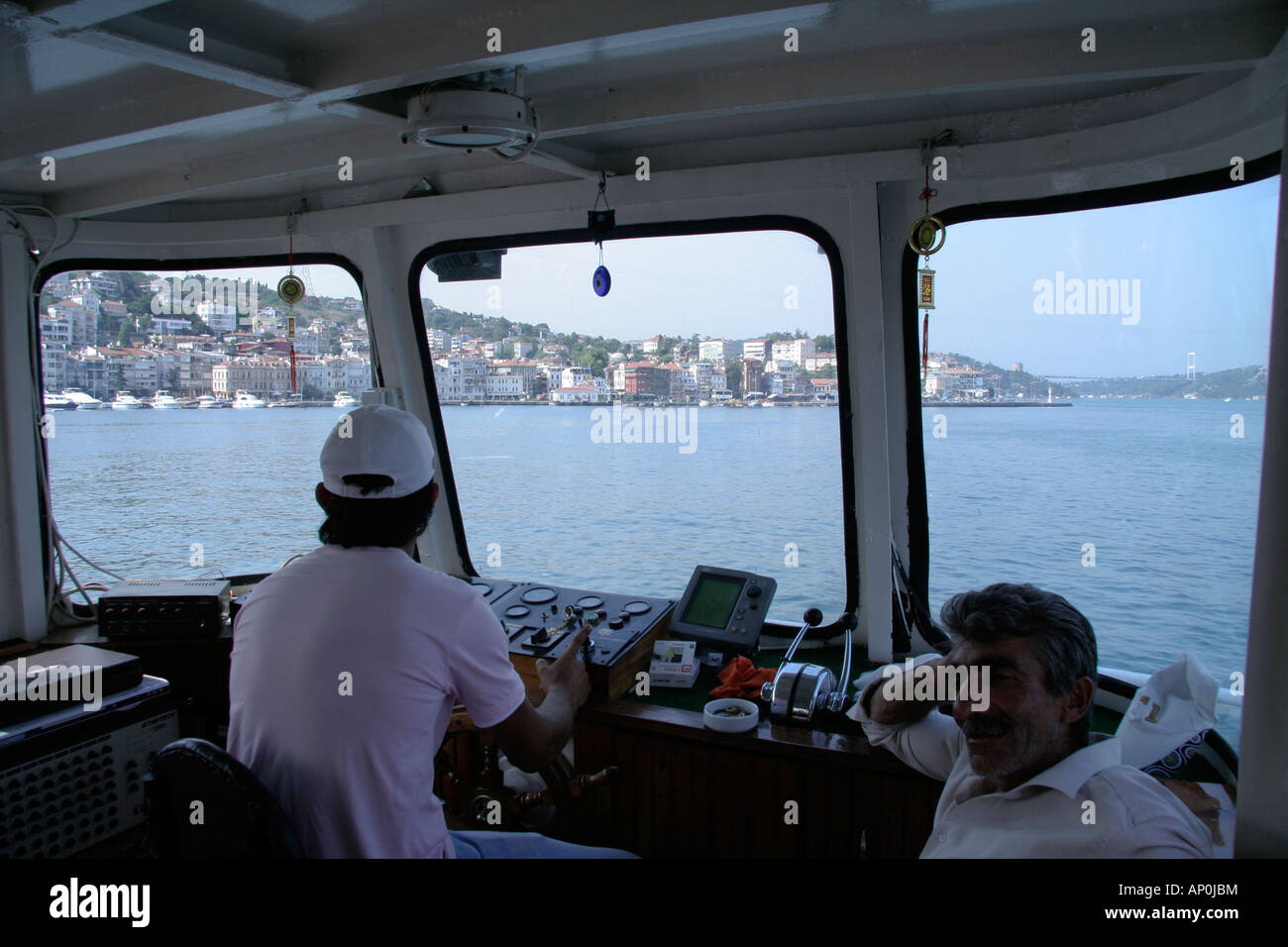 captain navigating his boat on the bosphor istanbul turkey Stock Photo ...