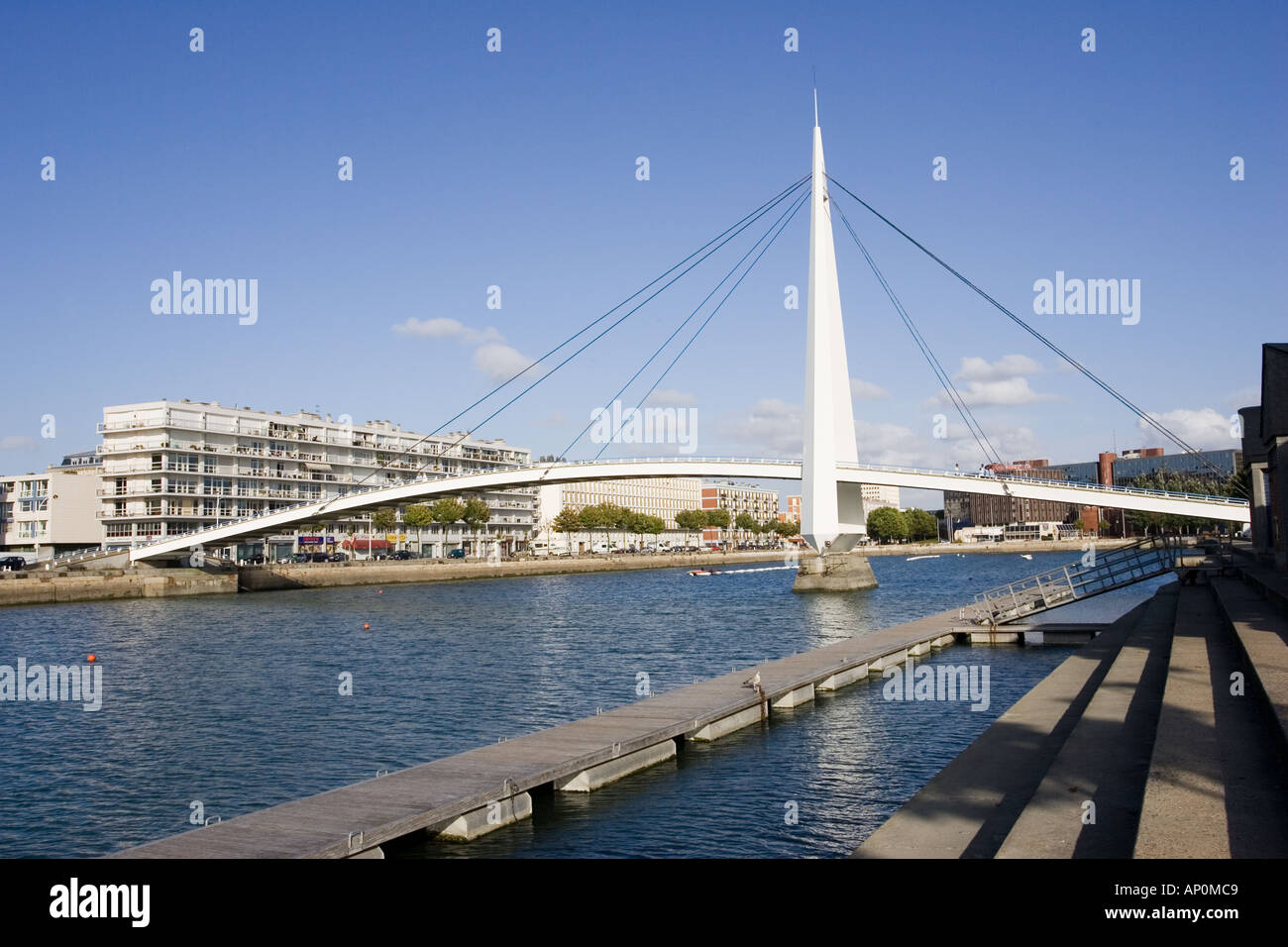 Modern pedestrian bridge over part of the harbour Le Havre France Stock