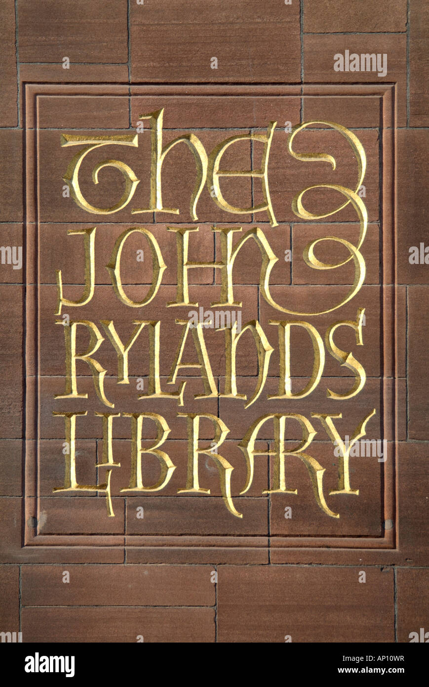 The John Rylands library red sandstone gold carved lettering Deansgate central Manchester UK United Kingdom England Europe GB Gr Stock Photo
