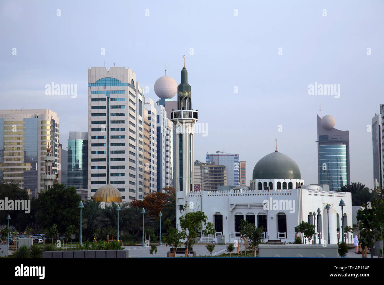 Modern skyscrapers and mosque, Abu Dhabi city, United Arab Emirates Stock Photo