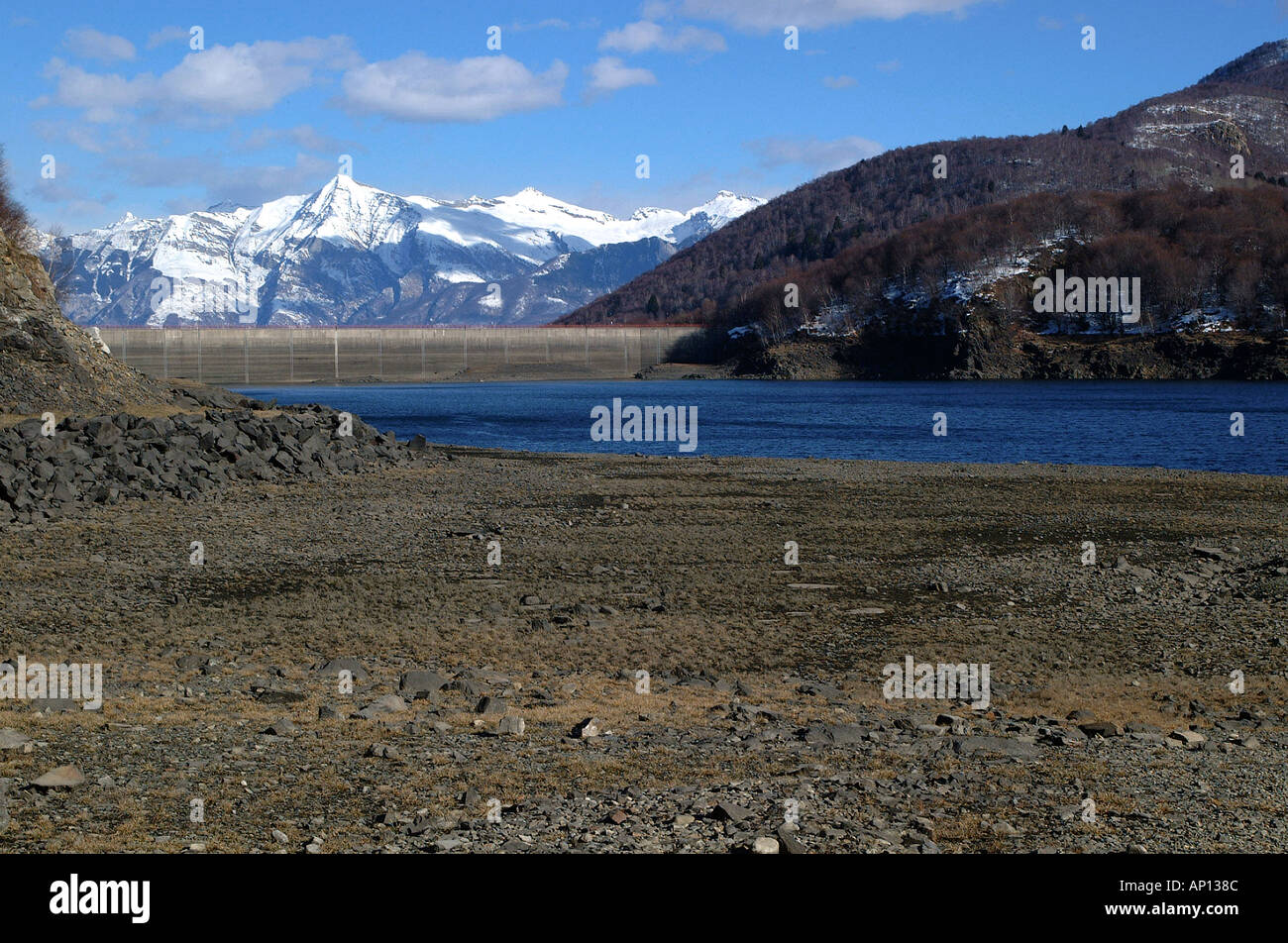 artificial lake mountain dike snow alps Stock Photo Alamy