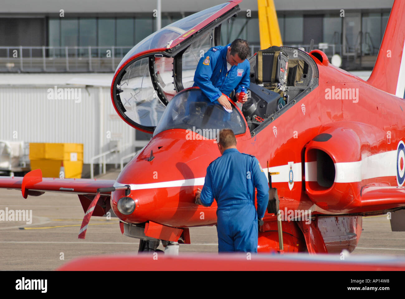 Ground crew prepare the Hawk aircraft for the RAF display team the Red Arrows at the Jersey International Air Display Stock Photo