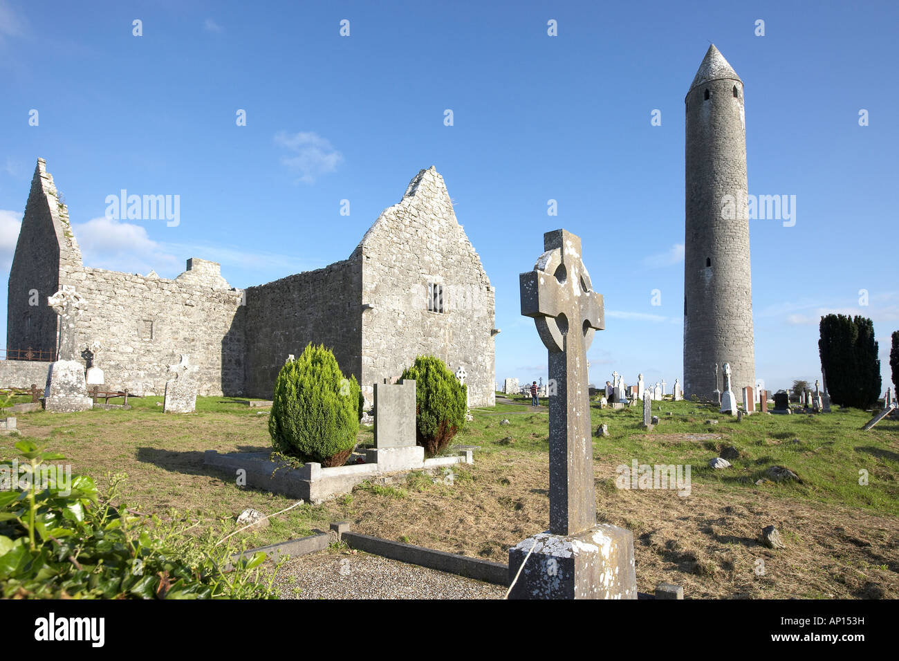Kilmacduagh monastic settlement and round tower county clare Republic of Ireland Stock Photo