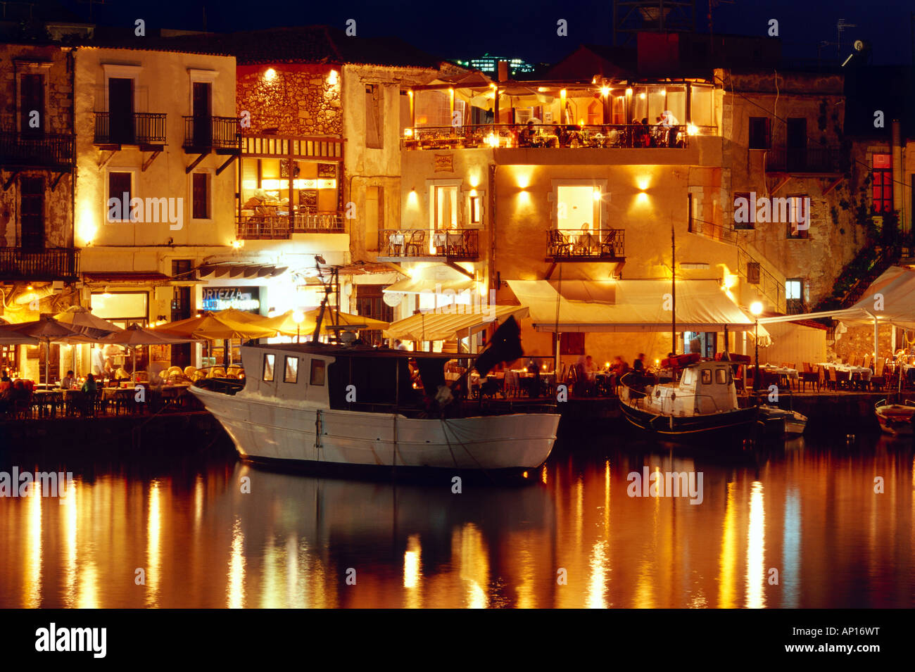 Taverns at night, Venetian Harbour, Réthimnon, Crete, Greece Stock Photo