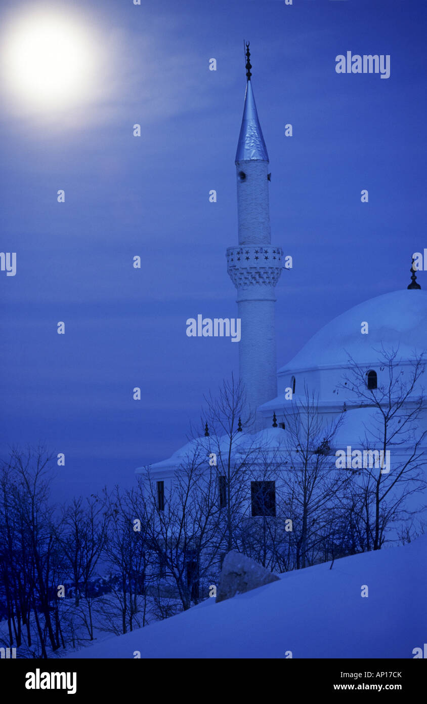 Mosque in winter at fullmoon, Sakklikent, close to Antalya, Turkey Stock Photo