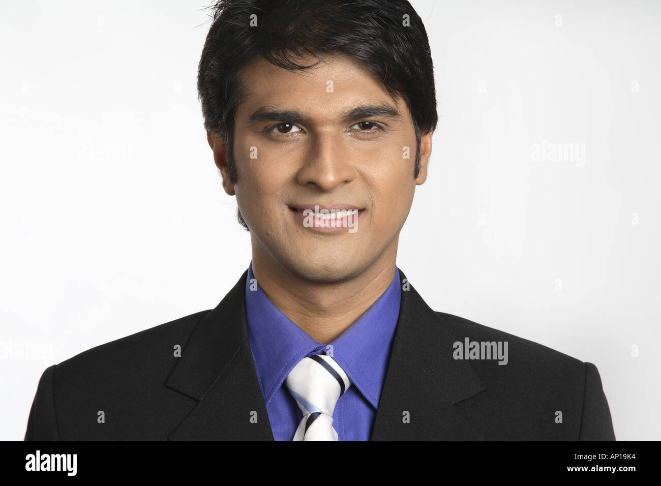 ANG200121 Executive looking in the front and smiling close up Model release No 687M Stock Photo