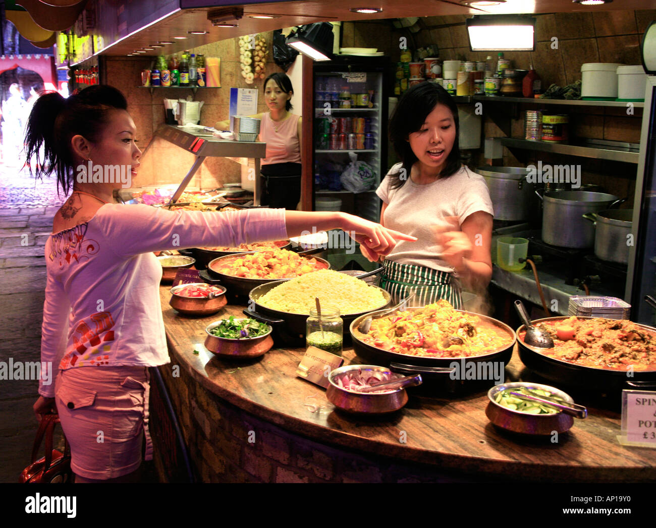 Food stall selling Chinese food at Camden Market in London Stock Photo