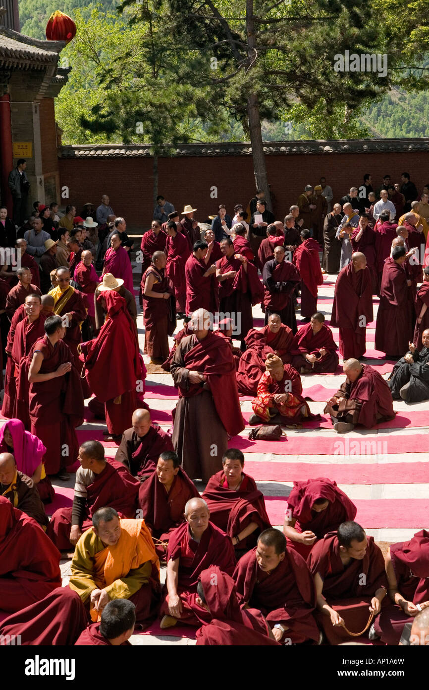 prayer ceremony, buddhist monks, court yard, during birthday of Wenshu, Xiantong Monastery, Wutai Shan, Five Terrace Mountain, B Stock Photo