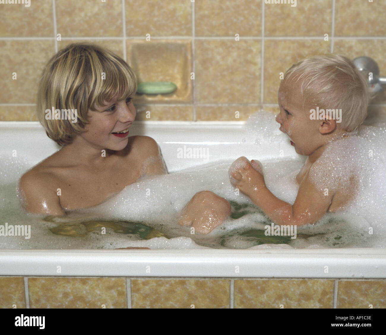 boy and girl bathing