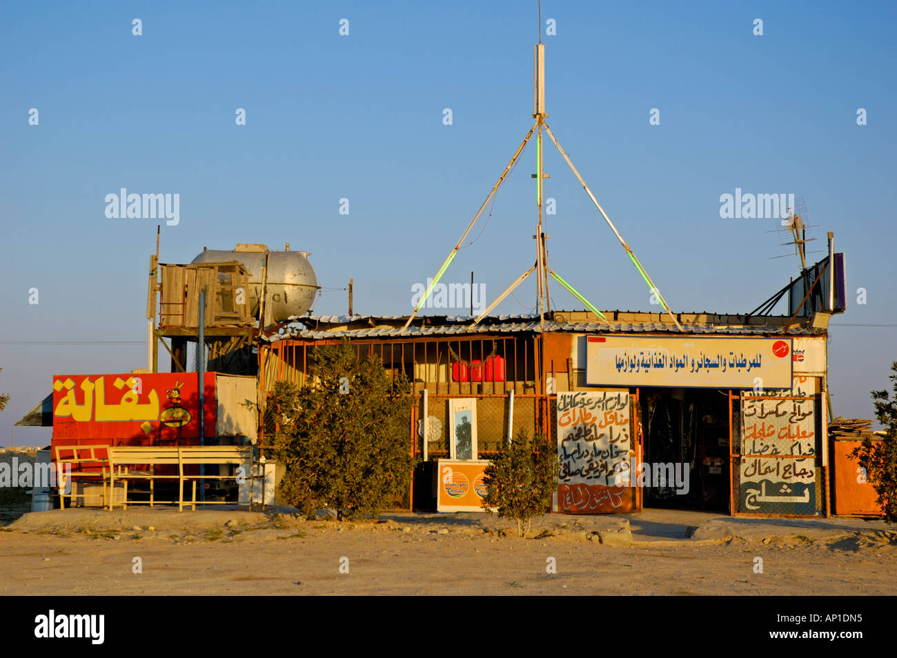 Early morning view of roadside store baqala in Kuwait on isolated desert road to Saudi Arabia Stock Photo