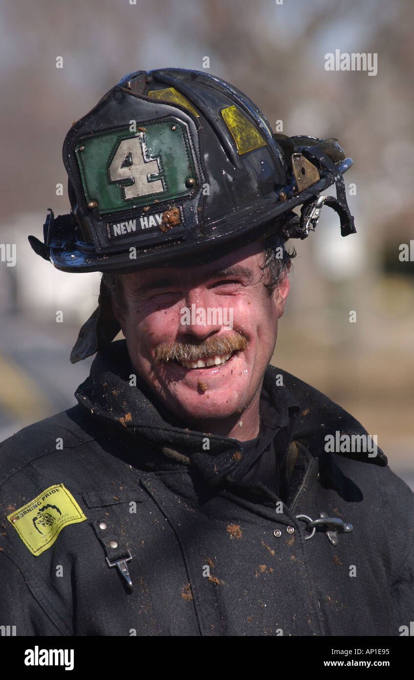Firefighters fighting a fire House fire firfighter job Stock Photo Alamy