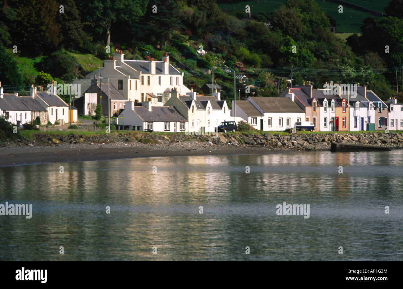 The small village of Cairnryan reflected in Loch Ryan near Stranraer
