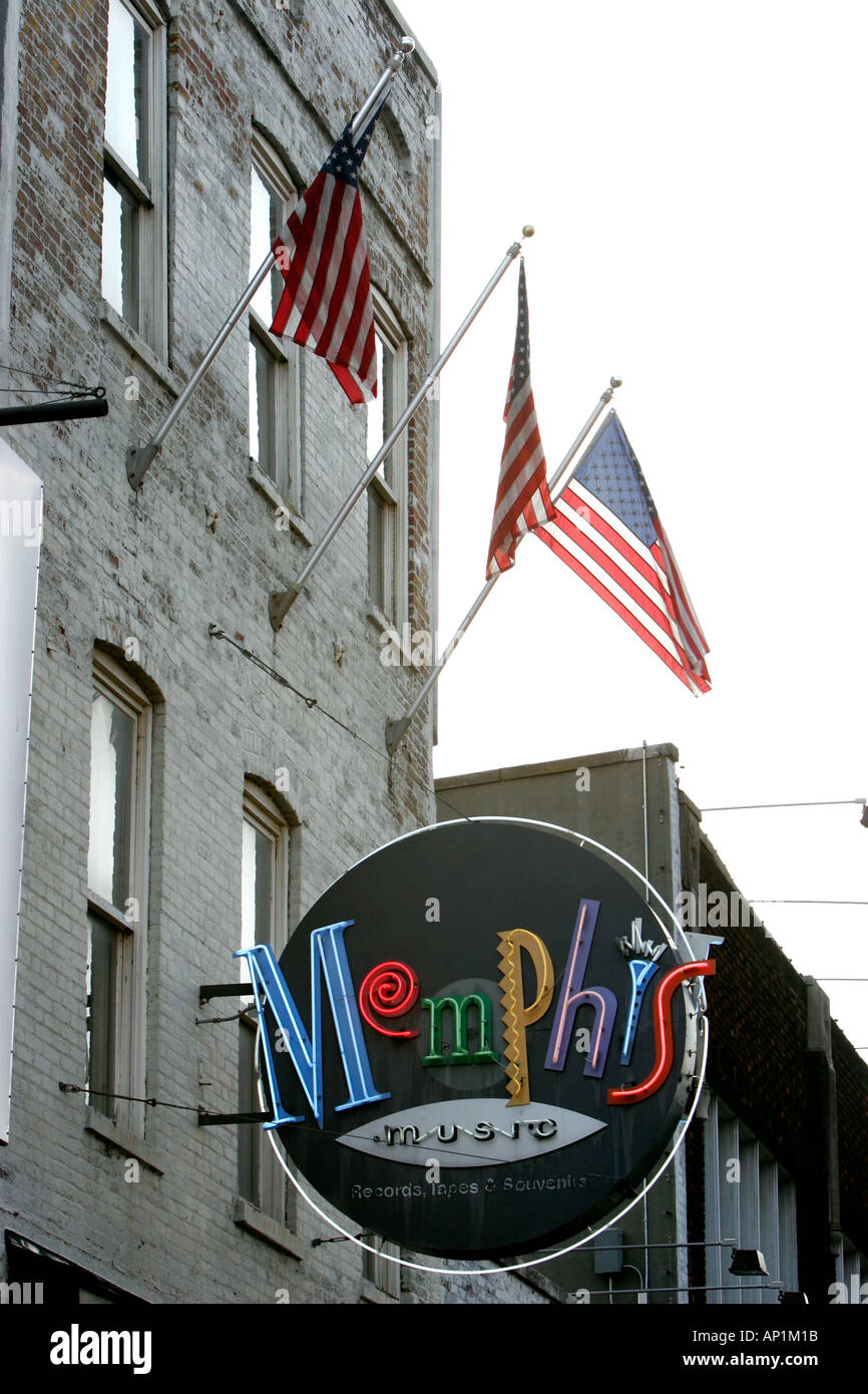 Three American flags above Memphis Music sign for record tape and