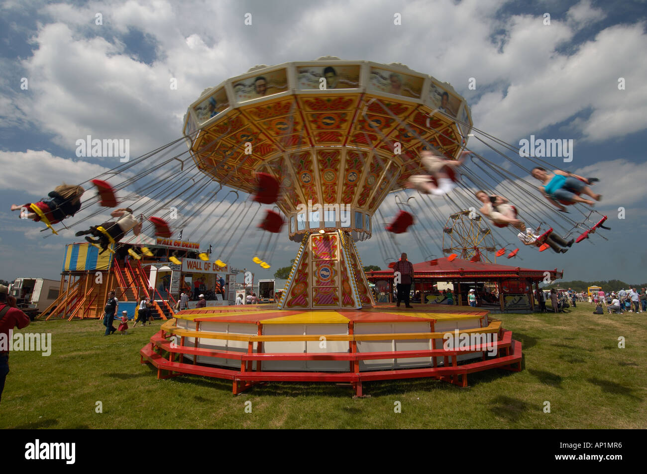 fair ground ride carousel swing chains Stock Photo