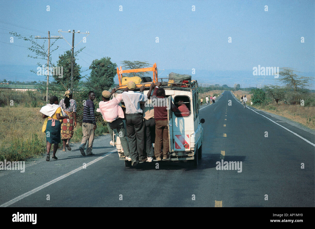 Overloaded local taxi or MATATU on Naivasha South Road near Lake Naivasha Kenya East Africa Stock Photo