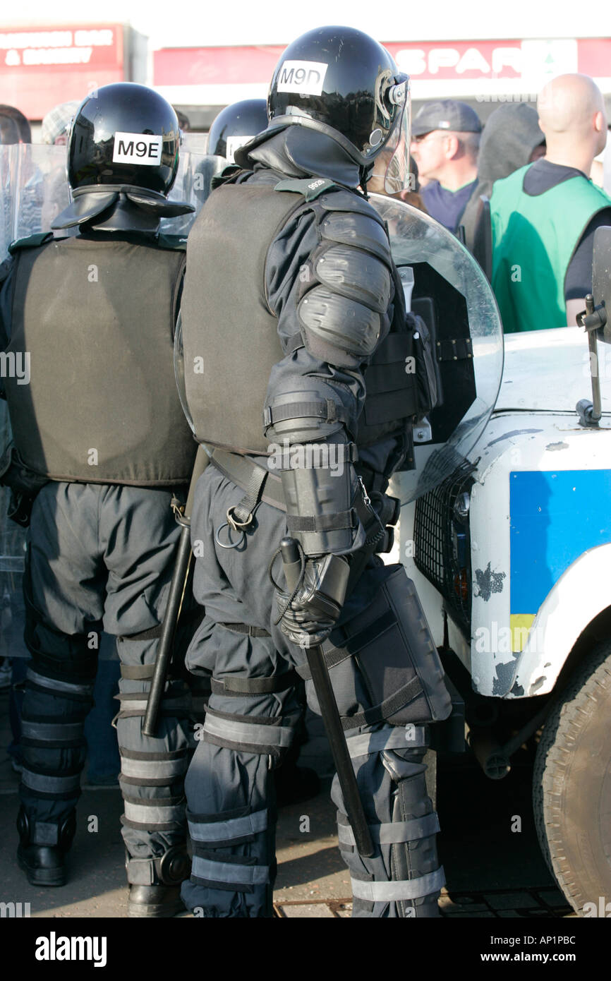 PSNI officer in riot gear with shield and baton on crumlin road at ...