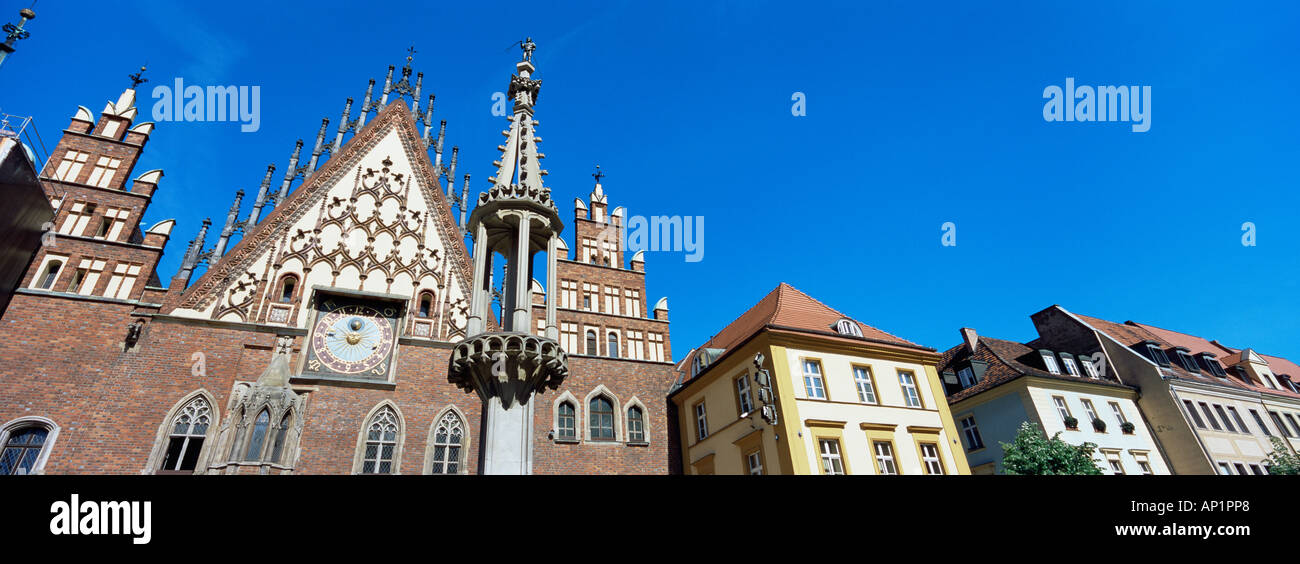 Eastern Europe Poland Lower Silesia Dolnoslakie Wroclaw panoramic view of top of Town Hall with whipping post preggierz foregrou Stock Photo