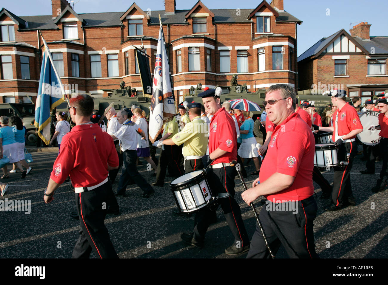 loyalist band marching on crumlin road at ardoyne shops belfast 12th