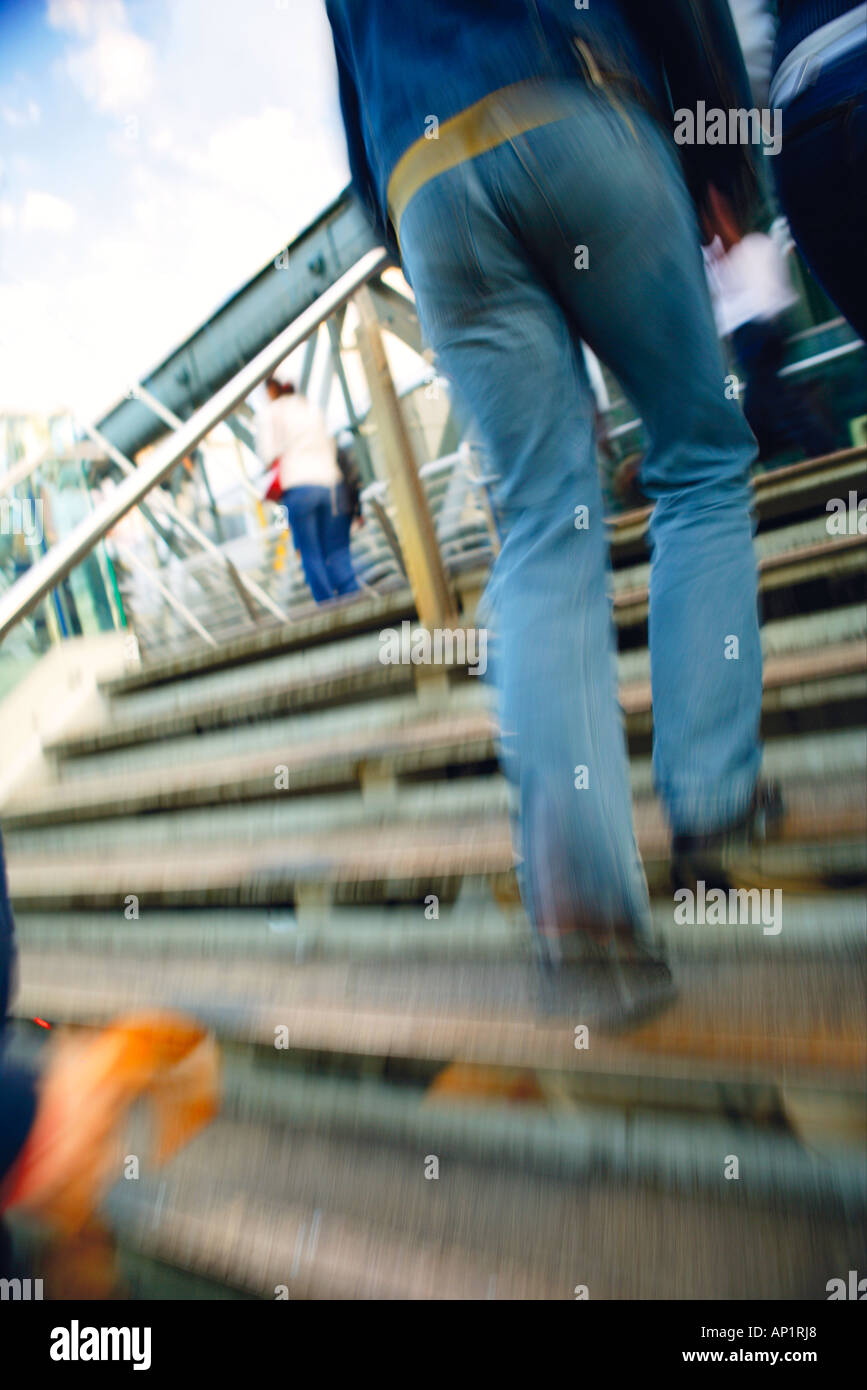 Blurred View Youth Ascending Steps To Golden Jubilee Hungerford Bridge London UK Stock Photo