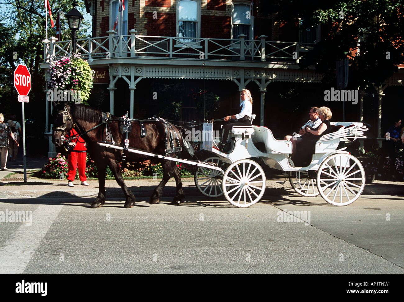 Tourists travelling in a horsedrawn carriage, Niagara on the Lake, near Niagara Falls, Ontario