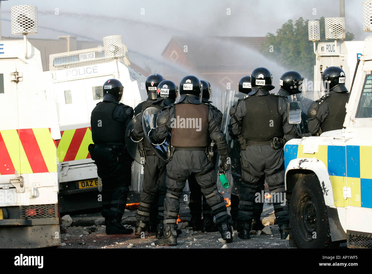 Police officers watch streets hi-res stock photography and images - Alamy