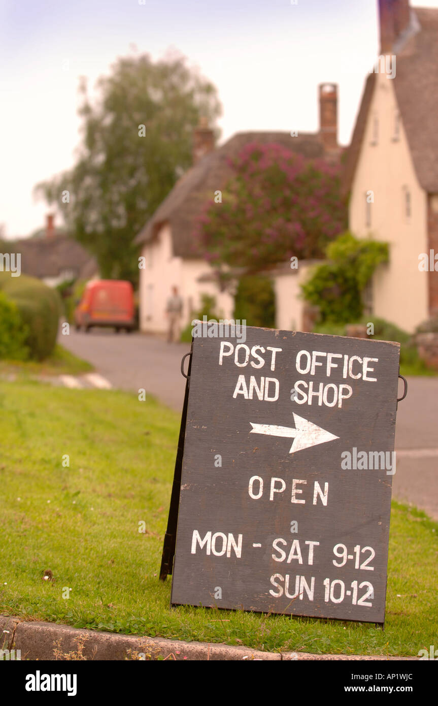 A SIGN FOR THE VILLAGE SHOP AND POST OFFICE AT BRIANTSPUDDLE IN DORSET