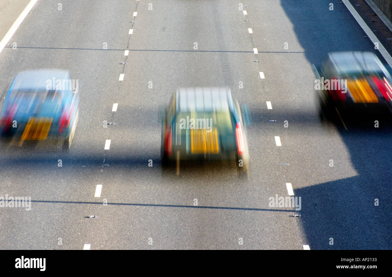 Car blur motorway UK M1 britain drive driving road highway motorway travel car transport commute lanes 3 Stock Photo