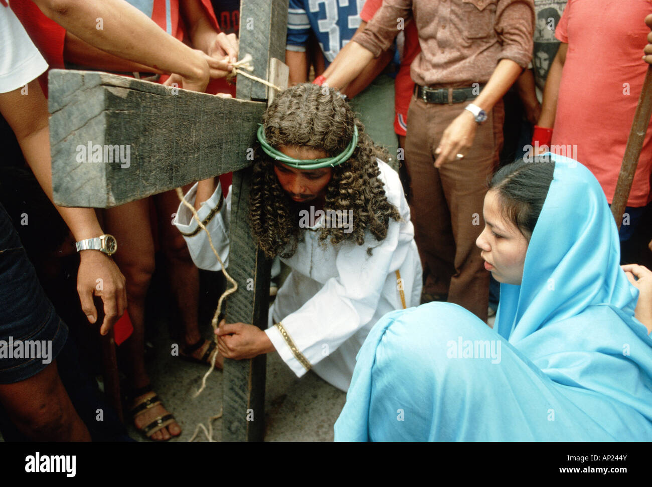 In a depiction of Jesus Christs crucifixion Filipino devotees are nailed to wooden crosses on every Good Friday Stock Photo
