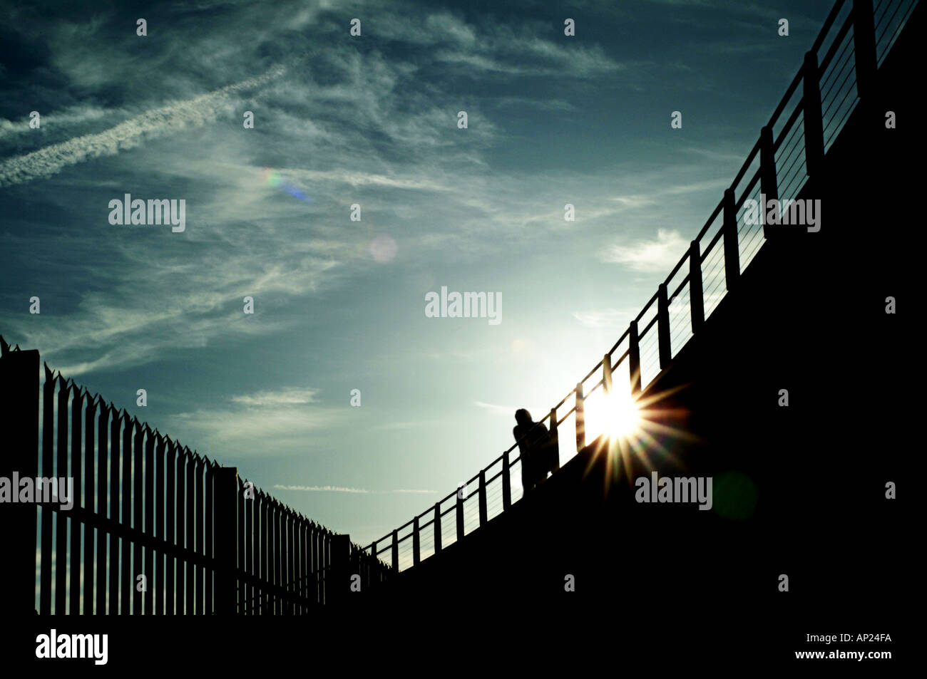 Silhouette man jogging on bridge hi-res stock photography and images ...