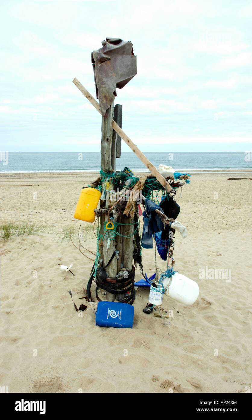 Rubbish collected on a post, Norfolk beach, UK Stock Photo Alamy