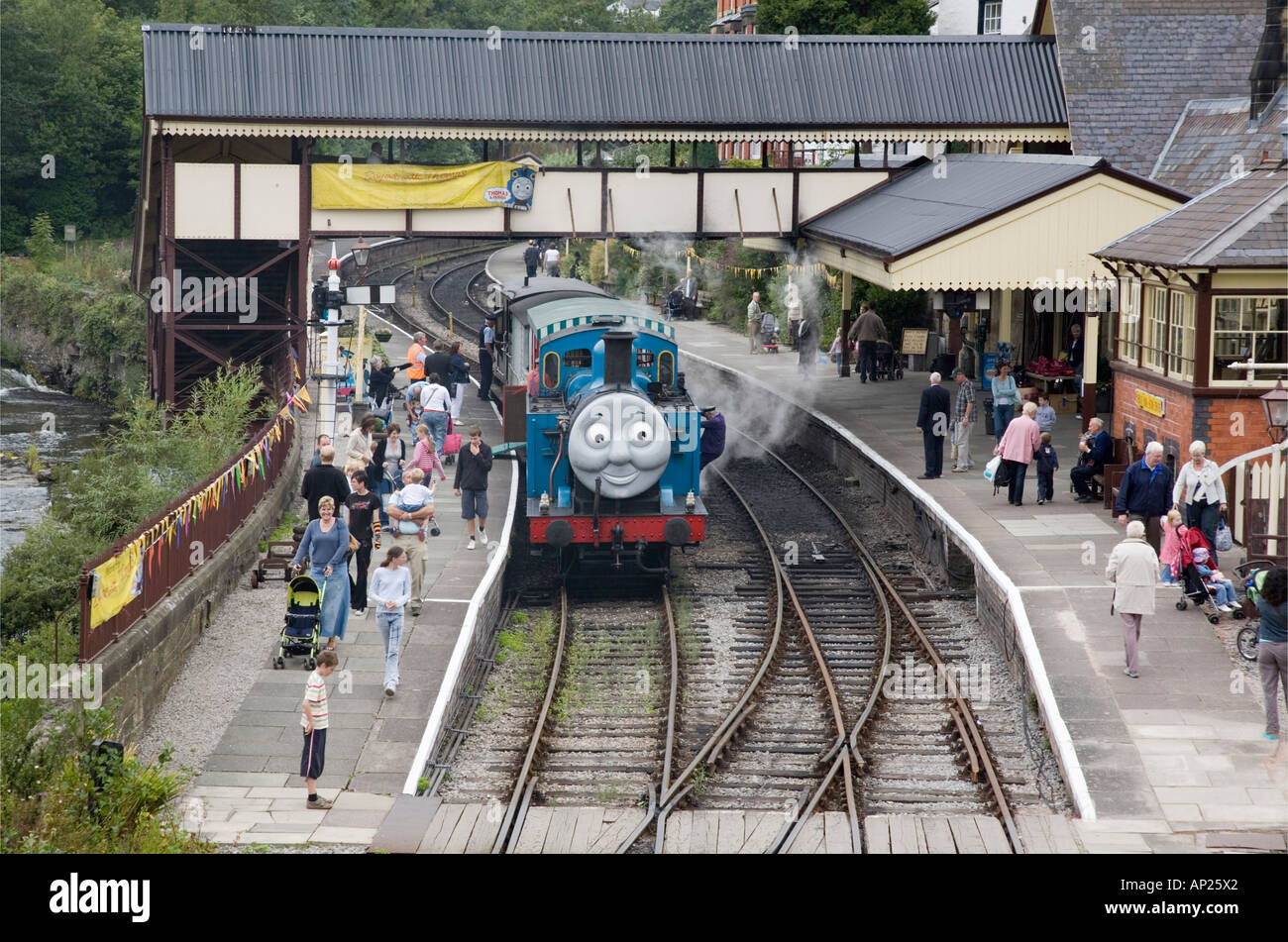 Steam train Thomas the Tank Engine giving brake van rides in station for special event on Llangollen Steam Railway Stock Photo