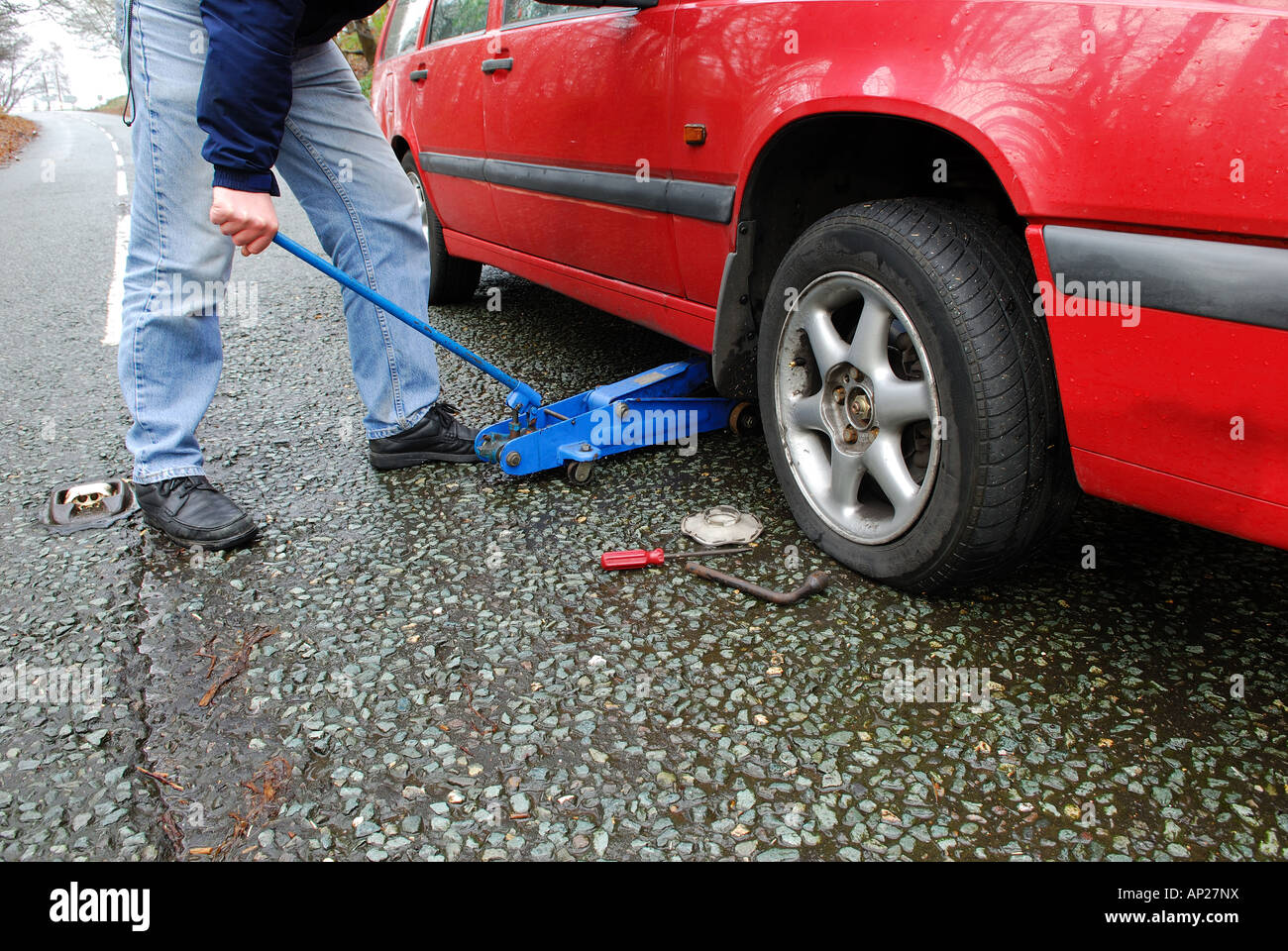 Car with Puncture. Stock Photo