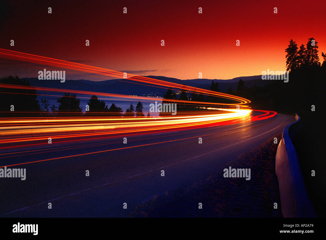 Time delay of headlights on mountain road Stock Photo Alamy