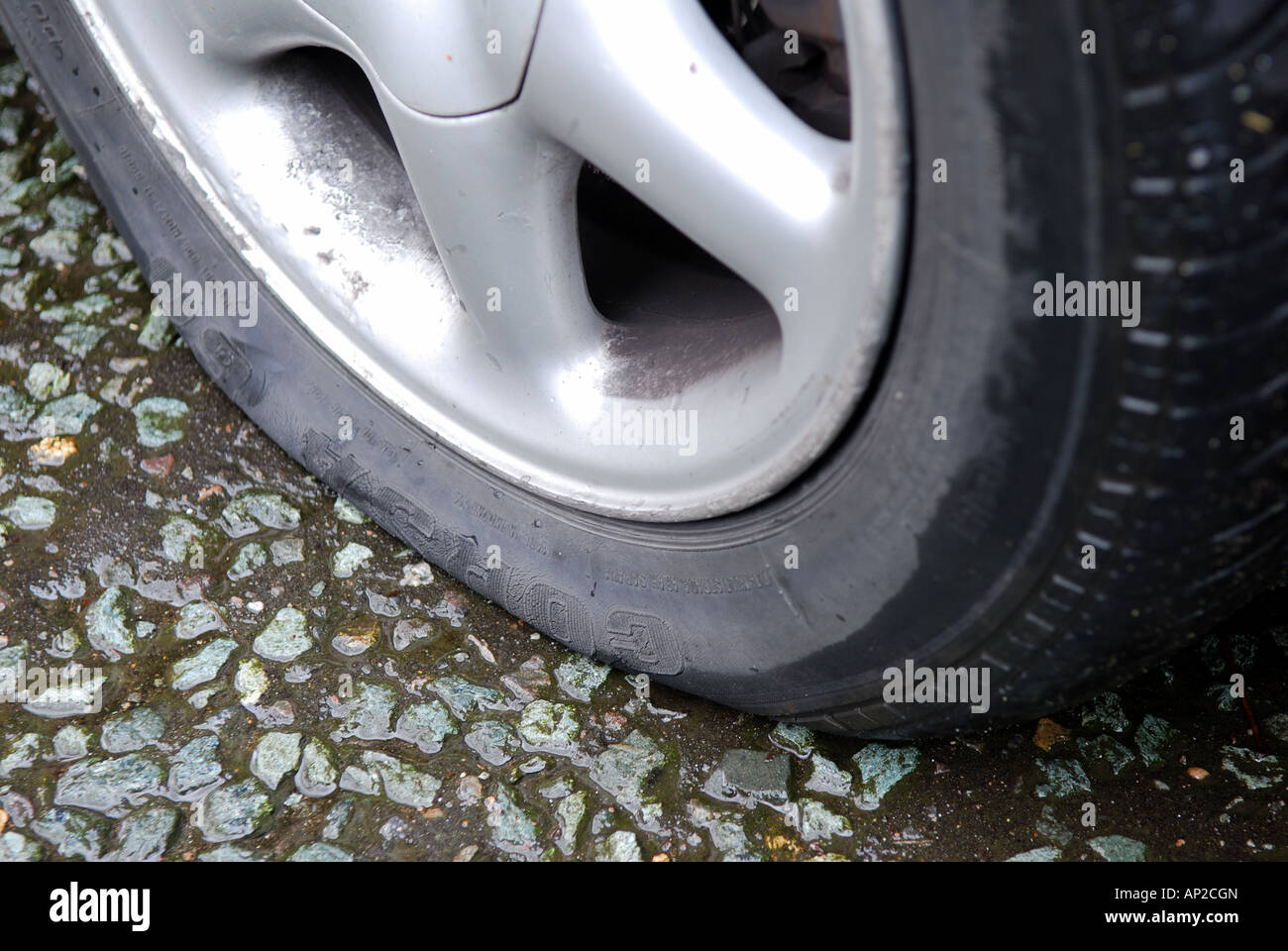 Puncture /flat tyre. Stock Photo