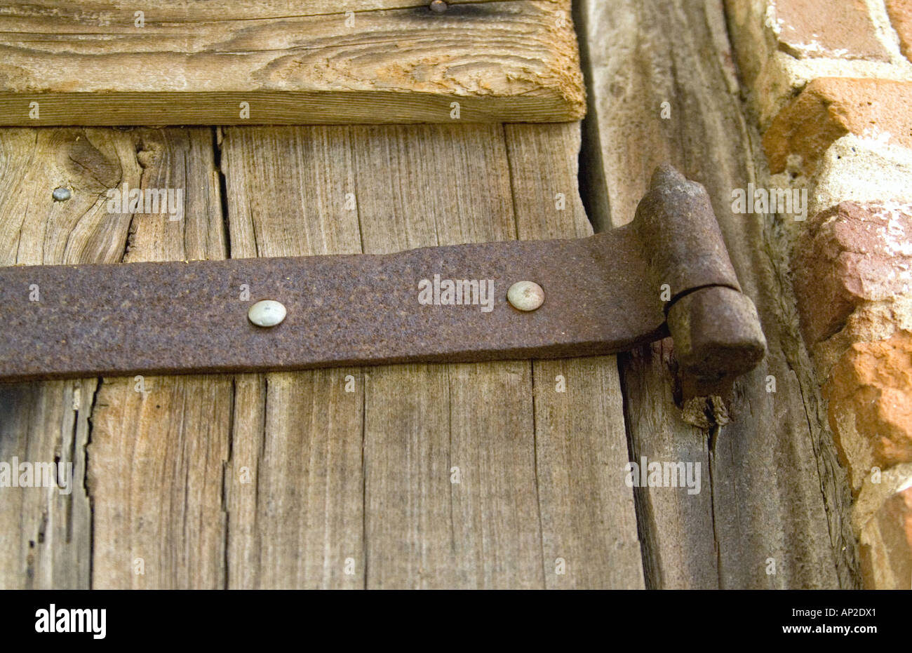 Antique door hinge Stock Photo - Alamy