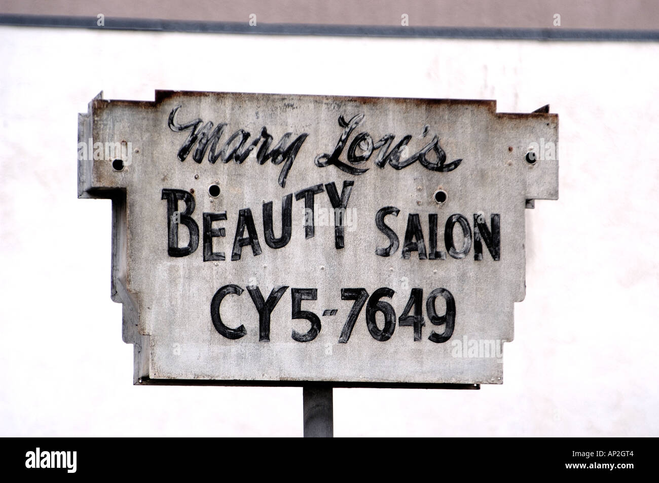 Beauty salon sign showing old style exchange telephone number Hillcrest, San Diego California USA Stock Photo