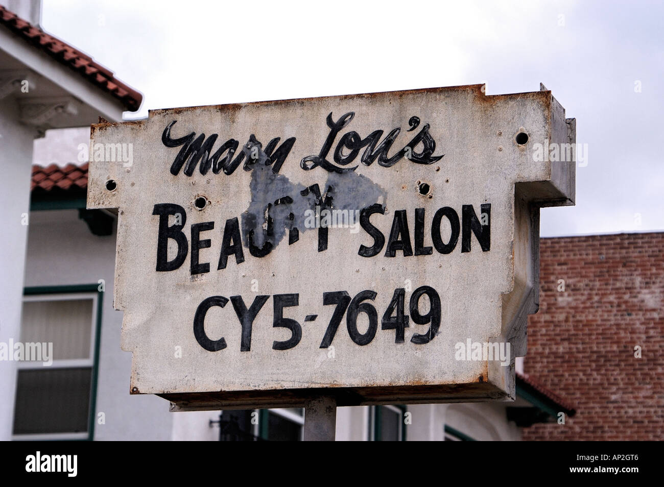 Beauty salon sign showing old style exchange telephone number Hillcrest, San Diego California USA Stock Photo