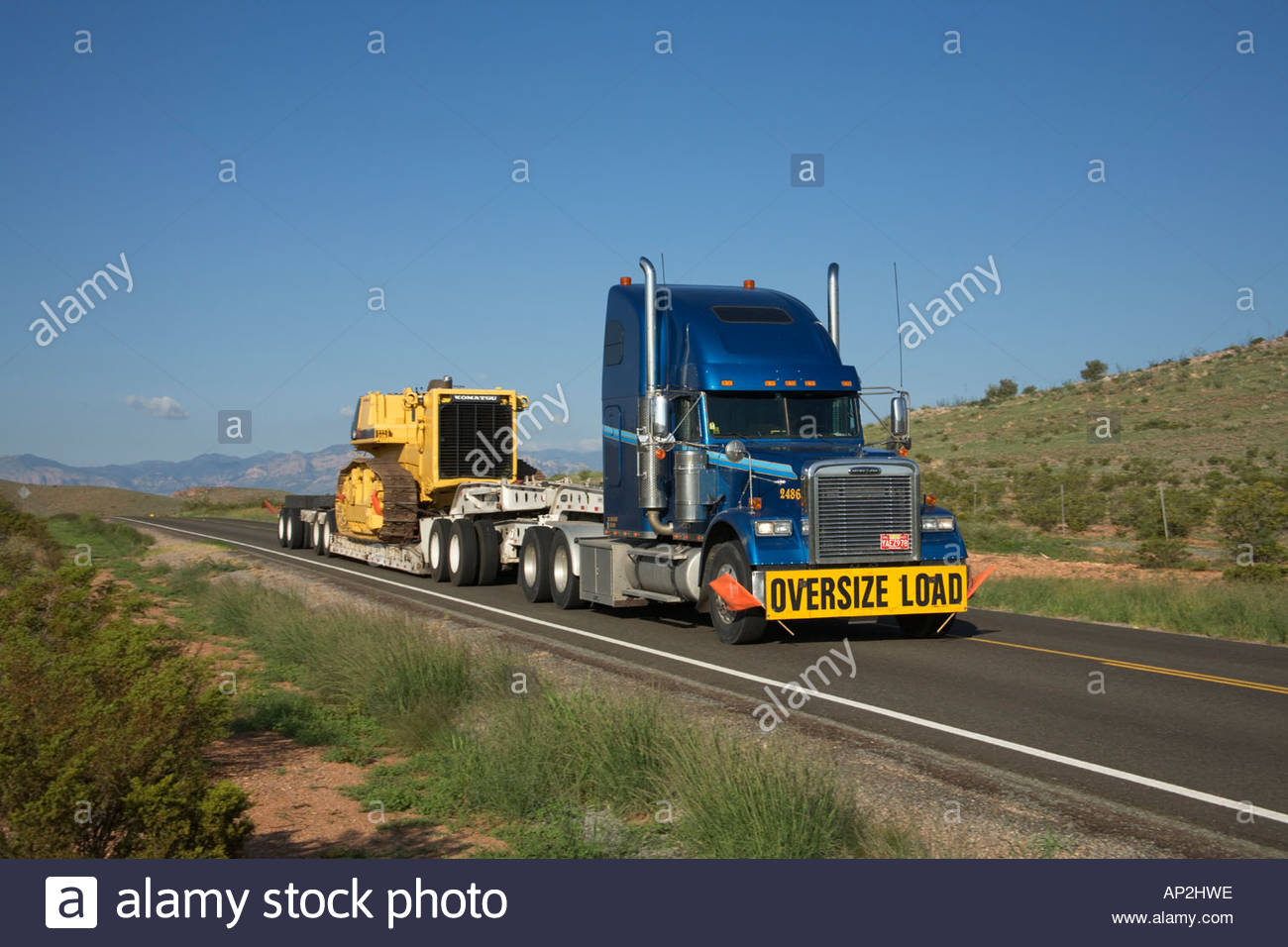 Truck hauling wide load oversize load State Road 9 in southwestern